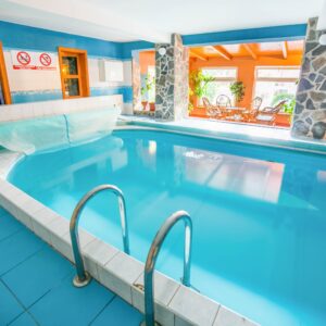 Orava u ski areálů a aquaparku v Penzionu Zelený Dom s polopenzí, wellness centrem a slevou do termálů